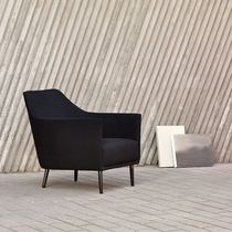 Contemporary armchair / fabric / metal /...