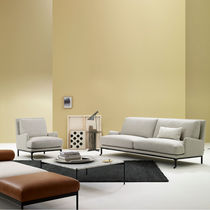 Contemporary armchair / fabric / metal /...