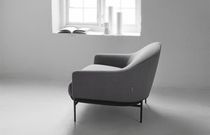 Contemporary armchair / leather / fabric