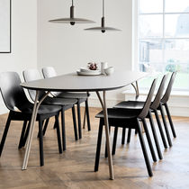 Contemporary dining table / laminate / steel...