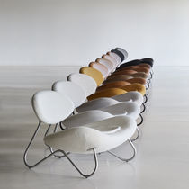 Contemporary armchair / fabric / leather...