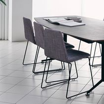Contemporary chair / fabric / leather /...