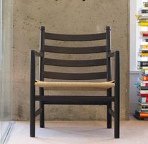 Contemporary armchair / wooden / by Hans...