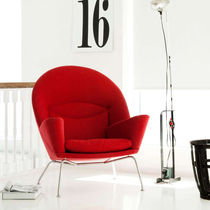 Contemporary armchair / leather / by Hans...
