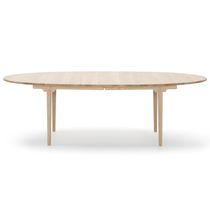 Contemporary table / wooden / oval / by...