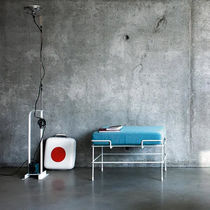Contemporary ottoman / leather / fabric...