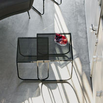 Contemporary nesting tables / glass / lacquered...