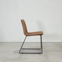 Contemporary chair / leather / lacquered...