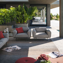 Contemporary armchair / fabric / lacquered...