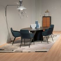 Contemporary chair / fabric / leather /...