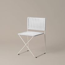 Design chair / metal / wicker / synthetic...