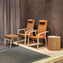 Contemporary armchair / leather / fabric...