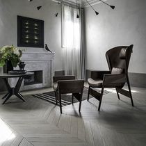 Contemporary armchair / leather / wooden...