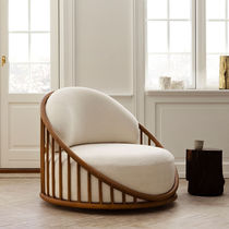 Contemporary armchair / fabric / rattan...