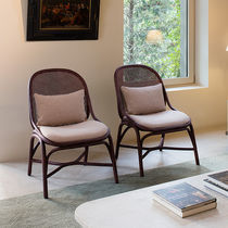 Contemporary armchair / fabric / rattan...