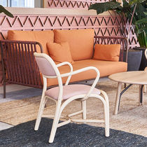 Contemporary armchair / leather / fabric...