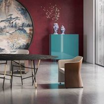 Contemporary chair / leather / fabric /...