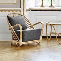 Contemporary armchair / fabric / rattan...