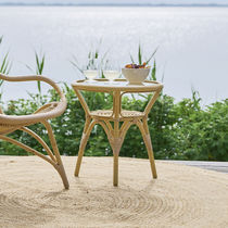 Contemporary side table / wicker / glass...