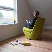Contemporary fireside chair / fabric / swivel...