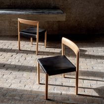 Contemporary chair / fabric / leather /...