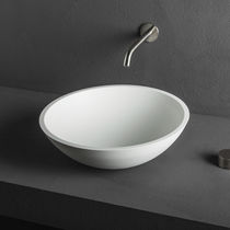 Countertop washbasin / round / Corian® /...