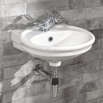 Wall-mounted hand basin / oval / porcelain...