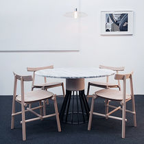 Contemporary dining table / metal / marble...