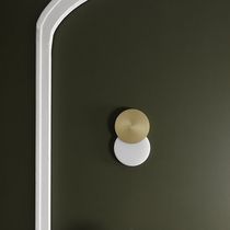 Contemporary wall light / brass / steel...
