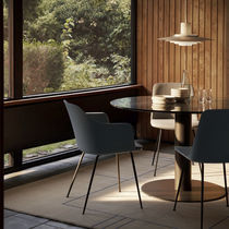 Contemporary armchair / fabric / leather...
