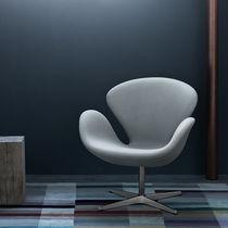 Contemporary armchair / fabric / leather...