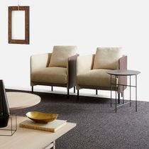 Contemporary armchair / fabric / leather...