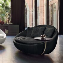 Contemporary armchair / leather / fabric...