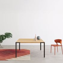 Contemporary table / oak / sheet metal base...