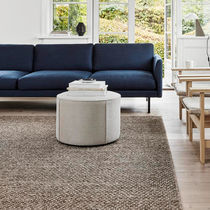 Contemporary pouf / leather / fabric / round