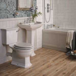 free-standing toilet / ceramic / with lever