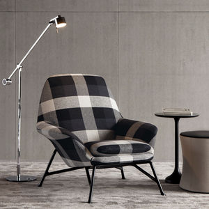 contemporary armchair / fabric / leather / cast aluminum