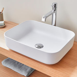 Countertop washbasin - MARINO - SANYCCES - ceramic / oval ...