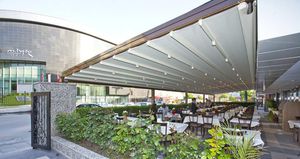 Wall-mounted pergola - ARKO - IASO - wooden / fabric canopy / modular