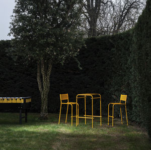 contemporary bar stool / painted steel / garden / yellow
