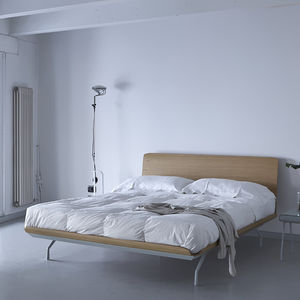 double bed / contemporary / with headboard / wooden