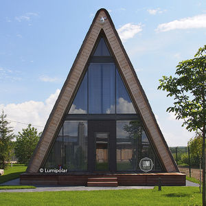 standard model house / contemporary / glue-laminated wood / glass