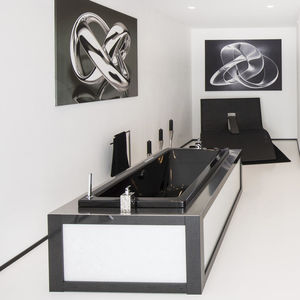 free-standing bathtub / natural stone / quartz / granite