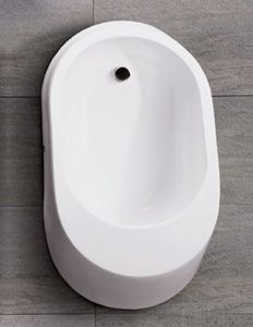 wall-mounted urinal / ceramic