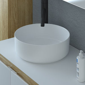 wall-mounted hand basin / round / porcelain / commercial