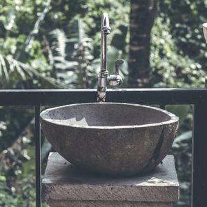 countertop hand basin / round / stone