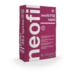 fixing adhesive mortar / for tiles / quick-set / hydraulic