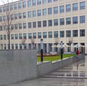 contemporary light column / stainless steel / cast aluminum / PMMA