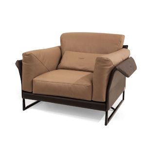 contemporary armchair / leather / lacquered metal / sled base