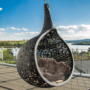 contemporary hanging chair / with removable cushion / polyurethane / basalt fiber